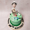 Perched atop this badminton cake is the star player, a figurine crafted with meticulous detail. Clad in his sporty attire, he stands poised and ready on this badminton cake, bat and ball in hand, as if caught in a frozen moment of anticipation before the decisive hit. 