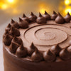 Top Piping of chocolate pistachio cake