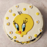 Adorning this Tweety Bird cake design are elegant decorations of white and yellow flowers, thoughtfully chosen to mirror Tweety's iconic colour scheme.