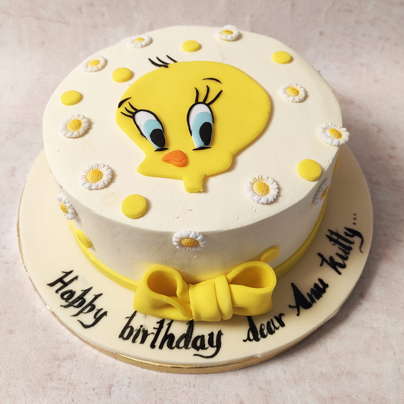  This Tweety cake sports a pristine white base, serving as a canvas to the vibrantly depicted image of the adorable Tweety Bird on top. 