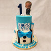 The bottom tier of this cartoon theme cake features a dapper suit, just like the one worn by the Boss Baby himself. 