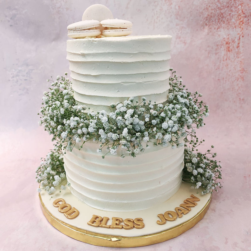 Baby's breath symbolise ever lasting love and innocence, commonly used in wedding bouquets but just as apt for Christian cakes which symbolise eternal love and faith to the divine.