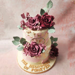 The base of this two tier rose cake is a pristine white, signifying the purity and innocence of true love. 