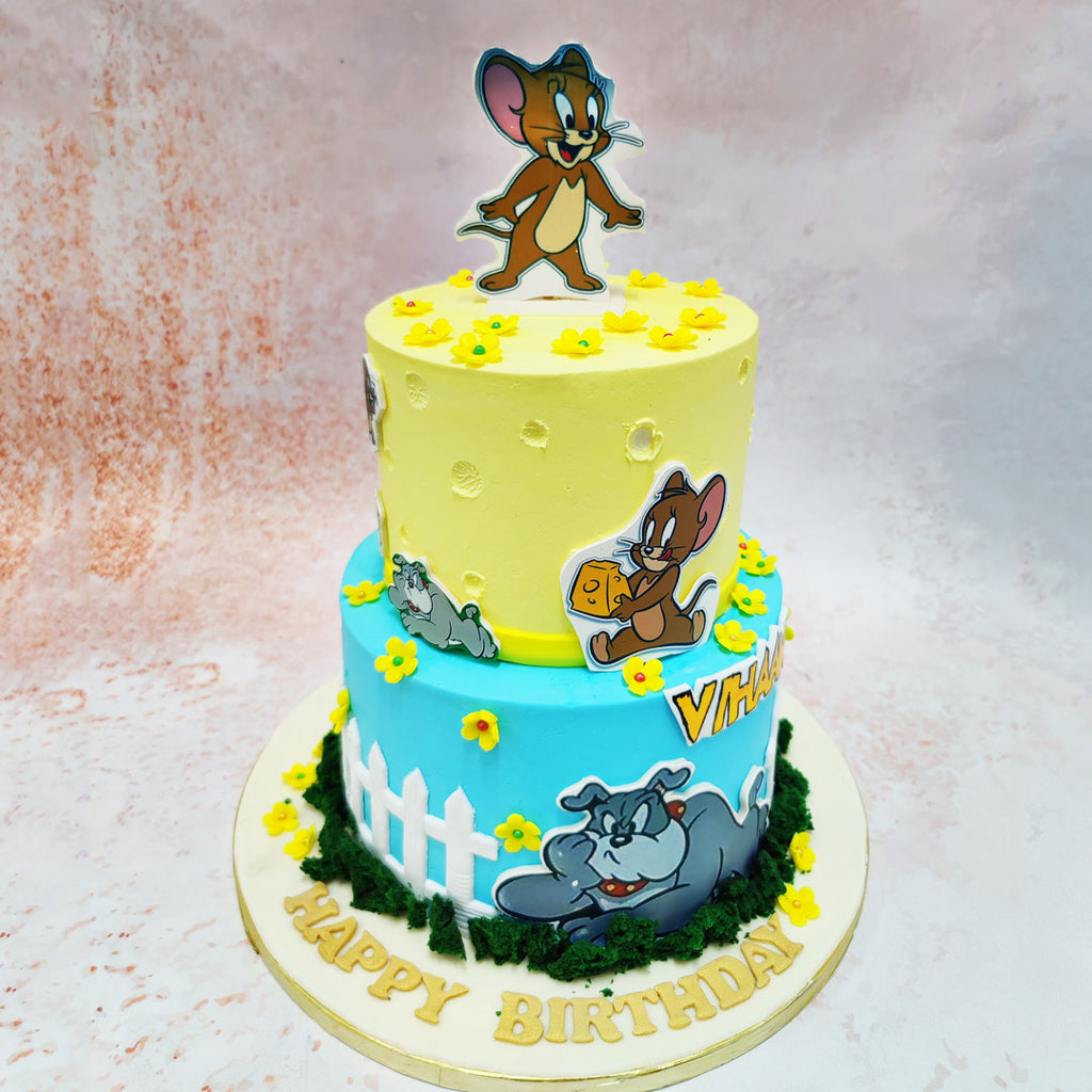 The edible images of Tom, Jerry, and the grumpy bulldog Spike are beautifully integrated into this Two Tier Jerry Cake, ensuring that each character looks as lively as ever. 