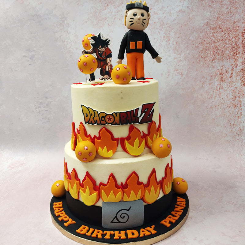 This Two Tier Naruto and Dragon Ball cake design has a clean, white base to highlight the elements featured on it. 