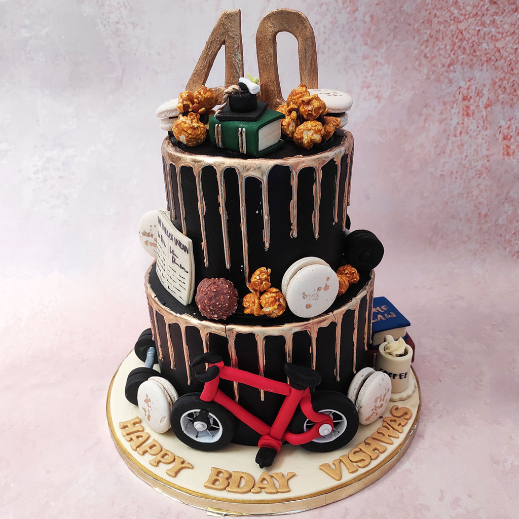 Both tiers of this bicycle cake feature a rich and decadent chocolaty base, representing the indulgence and sweetness of life. 