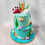 The edible work of art that is this  under the sea cake mirrors the captivating beauty of an aquarium, designed to ignite the imagination and curiosity of young minds.