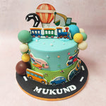 Every inch of the delectable masterpiece that is this Vehicle Cake comes adorned with a kaleidoscope of vehicles, each conveying a sense of excitement and wonder. 