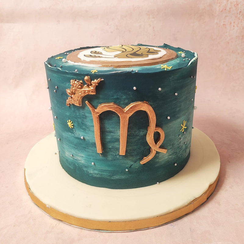 This Virgo theme cake boasts an ombre blue base, reminiscent of the night sky, which serves as a canvas for the constellation Virgo to shine.