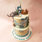 Snails leisurely make their way across this whale cake, leaving behind trails of sugary goodness. And let's not forget the vibrant aquatic plants that add a burst of colour and life to this underwater paradise.