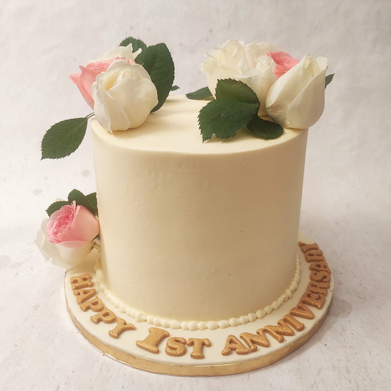 The simplicity of the pink rose cake design signifies the beauty found in the uncomplicated moments of a relationship, where love flourishes without any pretense or extravagance.