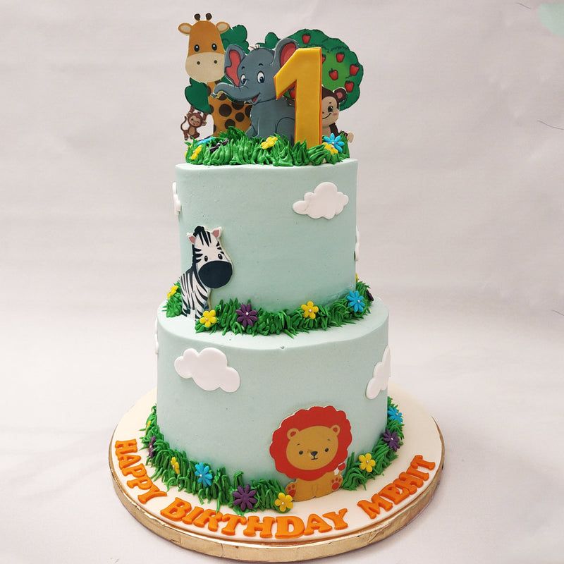 This 2 tier safari theme cake, a delightful confection that will transport your little ones to the heart of the African savannah. 