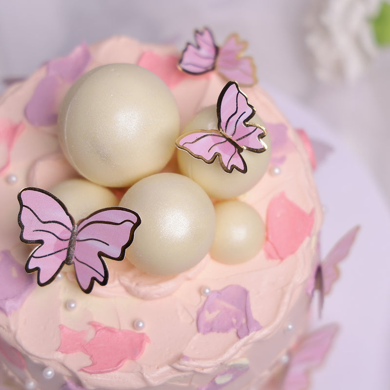 pink cake with butterfly