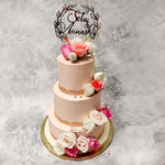 We have noticed that love and cake are slowly starting to become synonymous and this 3 tier cake has three times the love and the cake! The design of this 3 tier floral cake is custom made for a classy and elegant wedding or engagement celebration. 