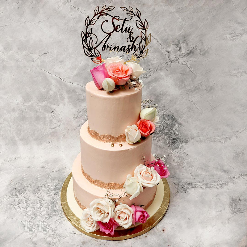 We have noticed that love and cake are slowly starting to become synonymous and this 3 tier cake has three times the love and the cake! The design of this 3 tier floral cake is custom made for a classy and elegant wedding or engagement celebration. 