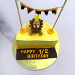 Top view of Lion king theme cake with simba the famous cartoon character sitting on top of the cake 