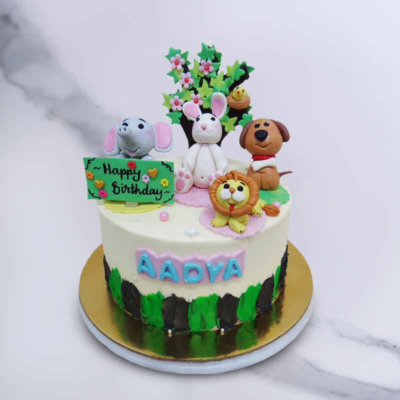 Animal themed birthday cake for kids who loves watching animals and this animal theme cake brings all his/her favourite animals together in one place