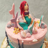 This Ariel theme cake also features plenty of aquatic treasures from edible mermaid tails embedded into the top in a way that makes it look like her mermaid friends have deep-dived into this Ariel birthday cake for kids just like we're sure you'll do after just one bite! 