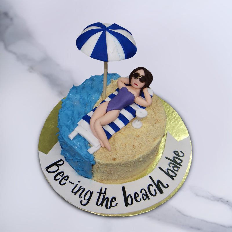 It's time to soak up the sun with this sunbathing cake. We 'a-shore' you that every bite of this beach theme cake will make you feel you're standing at the seashore.  So if you can't get to the beach right now, don't worry, with this beach cake we'll get the beach to you!