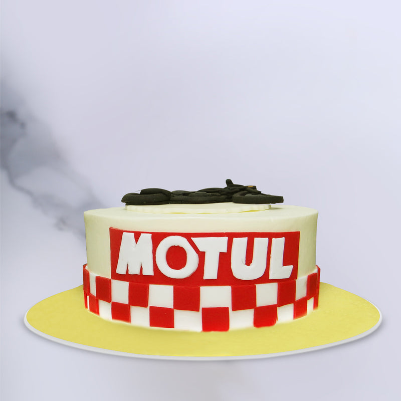 Bike theme cake which contains a fondant Royal enfield himalayan bike on top of the cake and a racing flag covered on sides. This is a perfect cake for all bike lovers specially a birthday cake for dad 