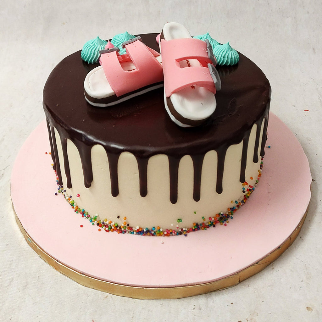  These pink Birkenstock sandals are as realistic as they are artistic and represent one's love for the brand, perfect as a birthday cake for wife or any special lady in your life that goes bananas over all things Birkenstock, even a Birkenstock cake.