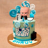 This Boss baby cake is elegant holding lot of elements like baby milk bottle, lollypops, suitcase and a famous character sitting on top like a boss in this baby boss theme cake