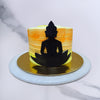This buddha cake design is outlined in chocolate and is seen sitting in a meditative pose in a lotus against a backdrop of orange, the color of peace and a light green to symbolise nature in all its glory.