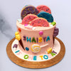 Candy theme cake which is ideal for kids birthday cake. This first birthday cake holds all the elements which a growing kids love from candies to ice-cream to donuts. This candyland cake will surely make your kid drolling over it