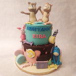 This two tier Winnie The Pooh cake design features a pink bottom tier and a blue top tier, embellished from top to bottom with a sprinkle of every child's dream. More precisely, this Chip and Dale birthday cake for kids sports a confetti-rain aesthetic.