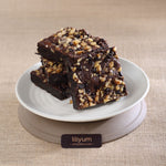 Eid special gift hamper - Walnuts really make the difference in this simple yet sinful chocolate brownie. Rich, sticky and delicious! Molten chocolate met biscuit and they lived happily ever after.