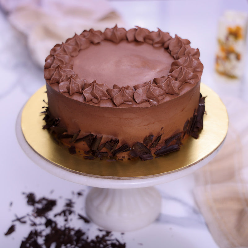 Chocolate vanilla cake a mix of chocolate and vanilla sponge covered with a delicious layer of chocolate buttercream. This choco vanilla cake will surely make you crave you for more and more