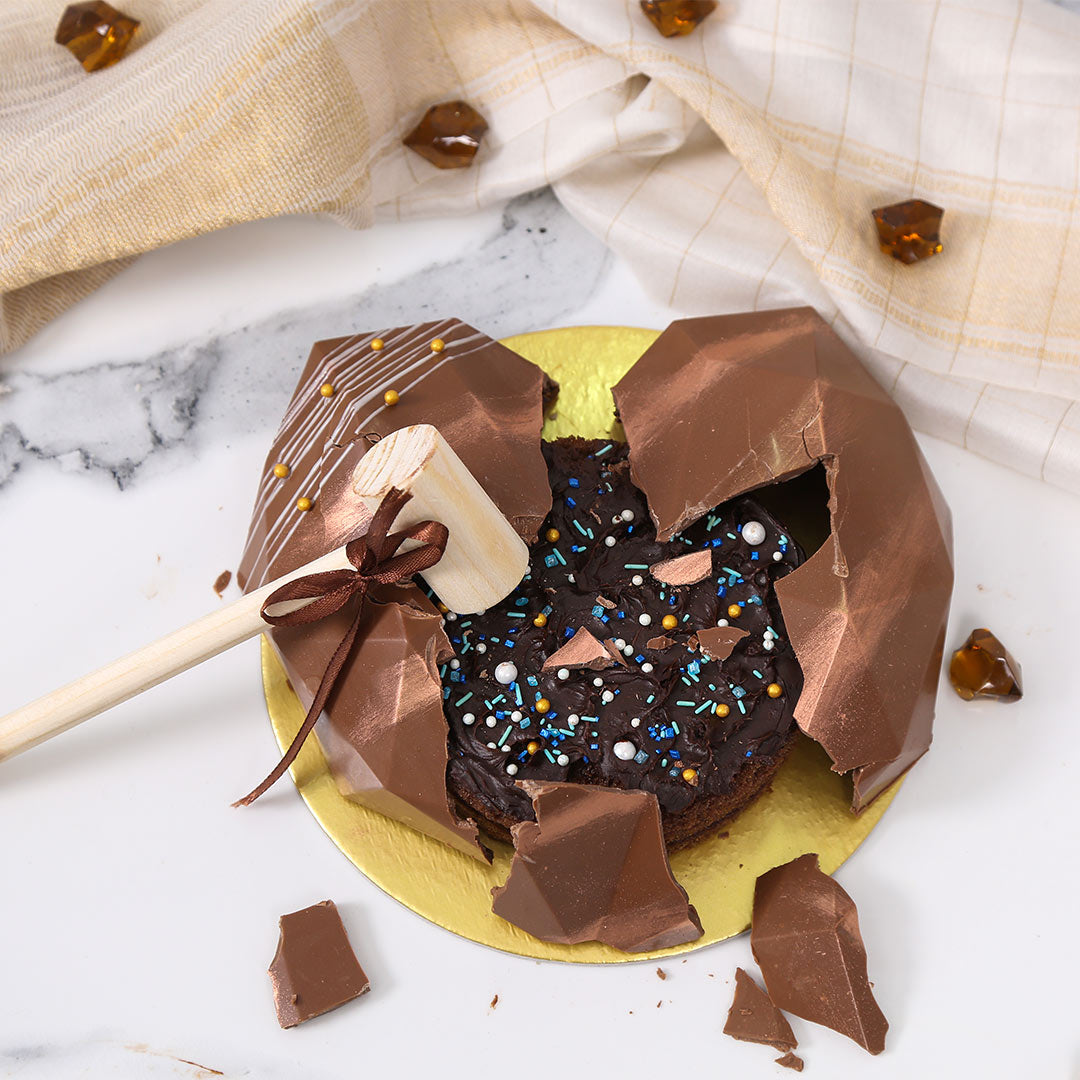 Chef Nitin Pal Singh - This pinata chocolate cake has an exciting hidden surprise  inside. Perfect for a beautiful surprise anniversary gift or even as a  birthday celebration cake. The kids and
