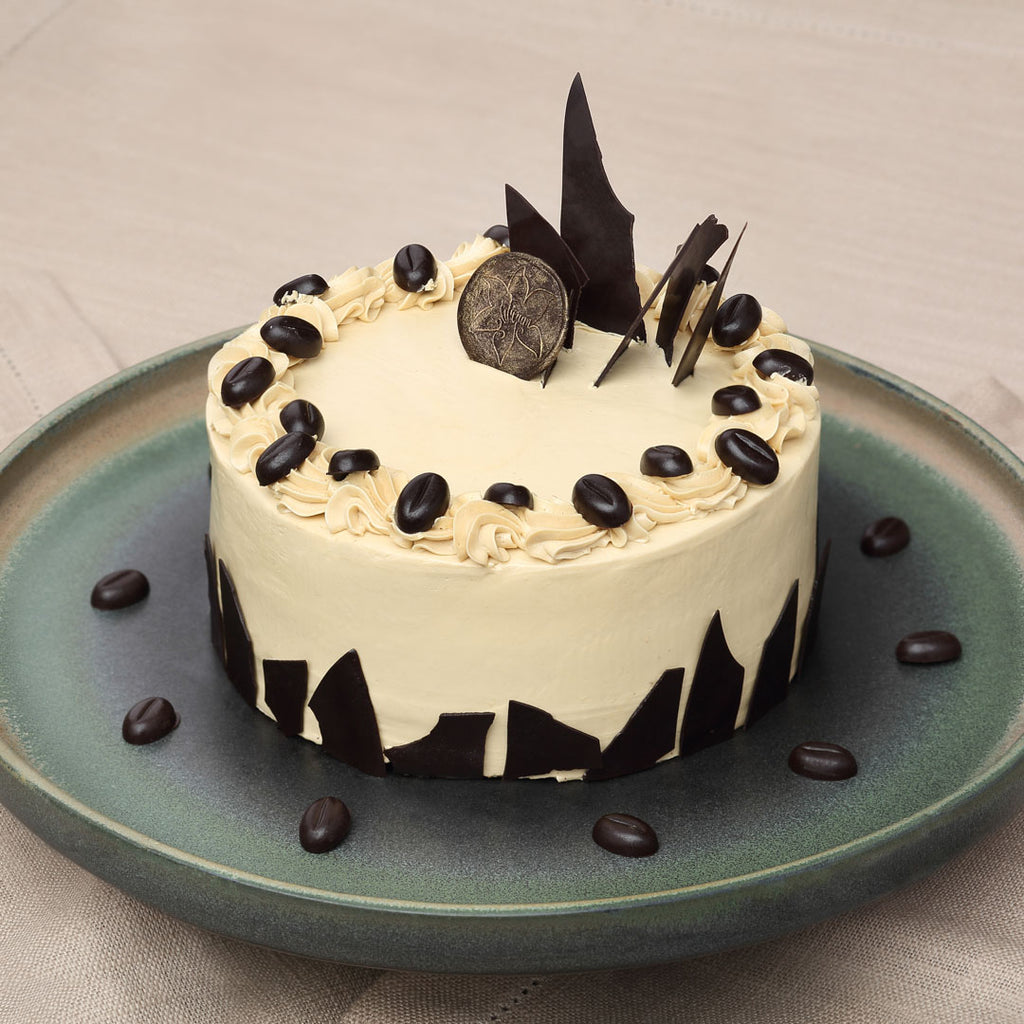 This Coffee cake is something that everybody loves, perfect in shape and taste this coffee buttercream has a very subtle design which is very attractive and a delight to the eye. Order online Coffee cake for same day delivery across Bangalore.