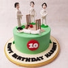   This cricket pitch cake is set on a green base that resembles any suitable cricket ground one might come across, depicting a popularly seen moment between teammates. 