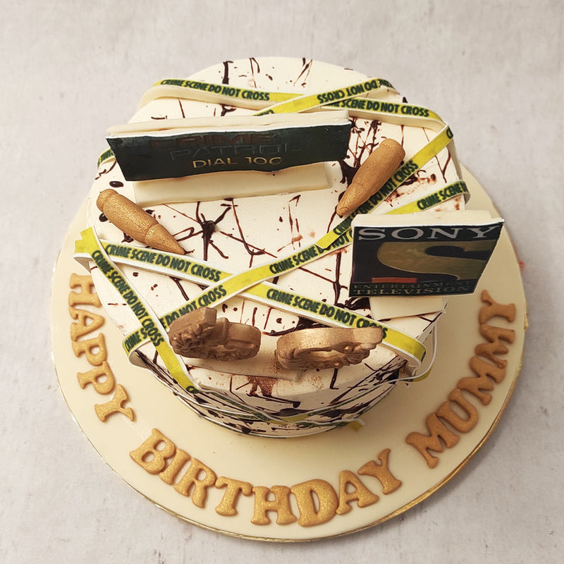 The Sony TV logo is also on display on top of this Crime Patrol cake as an homage to the channel that runs this popular show. Alongside it, is the Crime Patrol board, both displayed like billboard posters on top of this crime scene cake design.