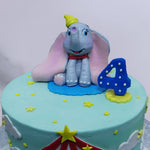 Zoomed view of our dumbo cake to show you the happy dumbo character sitting happily on top of this cake. This cartoon cake has all the elements that a kid will love to have