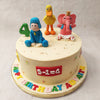 A math problem is displayed on the circumference of this Elly Pocoyo cake, alluding to the show's capacity to make learning fun.