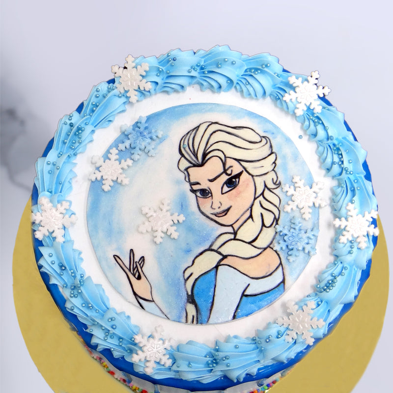 zoomed view of Frozen Elsa cake which is showing the hand crafted work on the fondant sheet - its a hand drawn image without suing any harmfull color in this Princess birthday cake