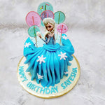 The base of this Elsa dress cake features the poofy pleats of Elsa's skirt. Flared out and fabulous, each pleat is edible yet falls like it was made of fabric. In line with the Frozen themed cake design, some removable and edible, sweet snowflakes have been used to garnish her frozen frock.