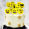 The base of this emoji cake is simply and elegantly frosted in white with delicious buttercream decorated with big, gold stars to add a little sparkle into the aesthetic. An edible, life-like bow-tie sits cushy at the bottom of this emoji themed cake and a white chocolate 'Congratulations' banner on top! 
