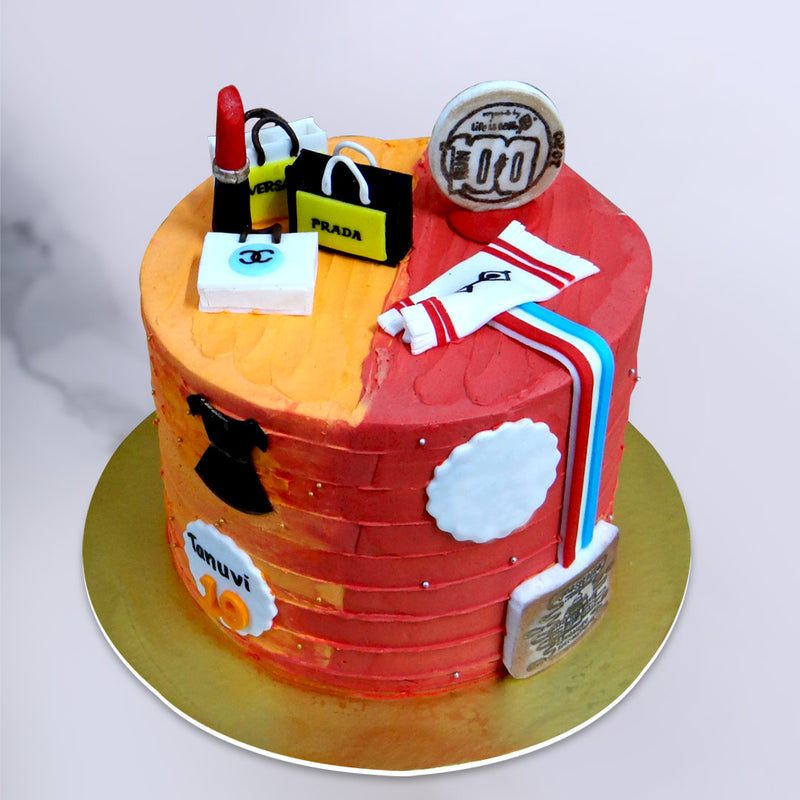 Shopping theme cake for those girls or women's who loves shopping. This female modern birthday cake holds elements of shopping as well as sports like marathon medals and towels