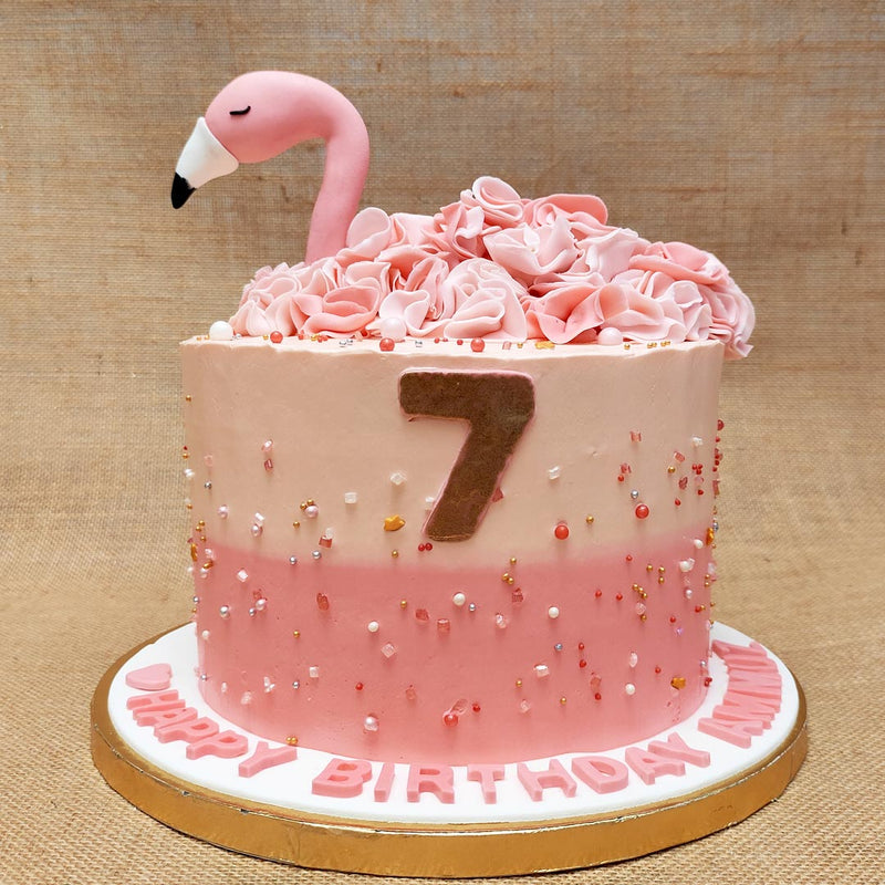 Front view of flamingo cake showcasing the calmness and beautiful look of this flamingo theme cake