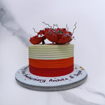 A Japanese styled floral cake with a buttercream yellow base that uses a bright red to orange gradient that reflects the intense colour theme of the beautiful red peonies on top of this beautiful red peony cake.