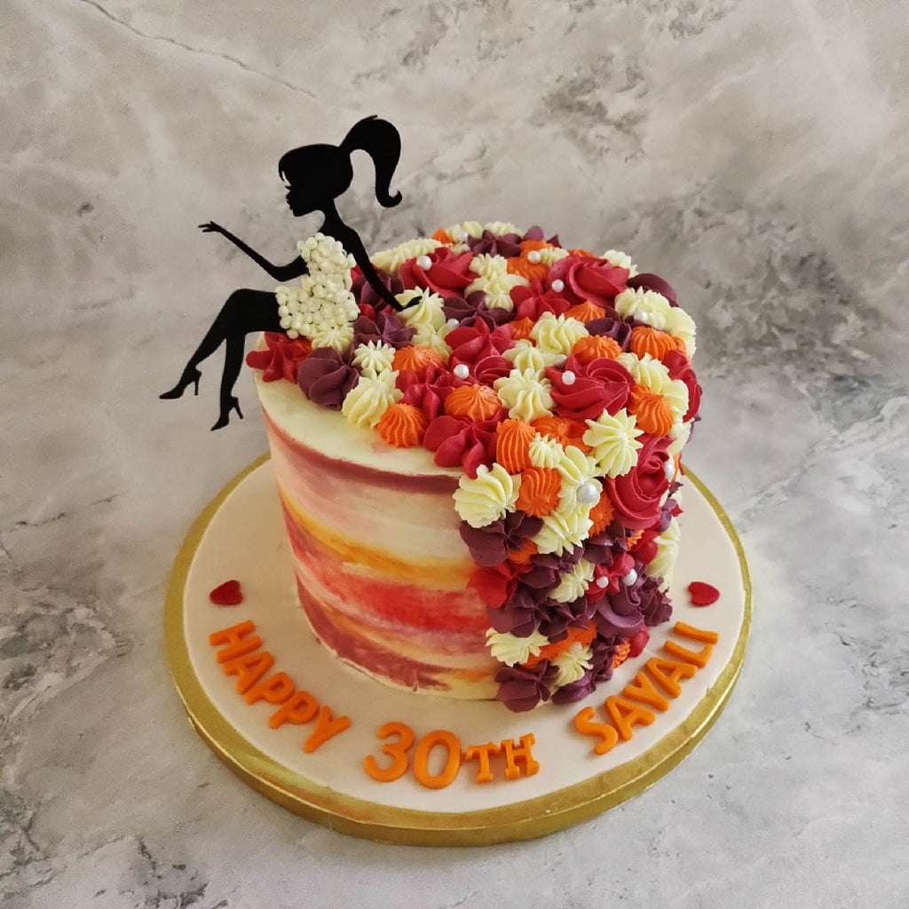 Floral dress theme cake for a lady who loves rosette design. This lady dress cake will surely be a perfect fit for a beautiful lady as a birthday cake or anniversary cake