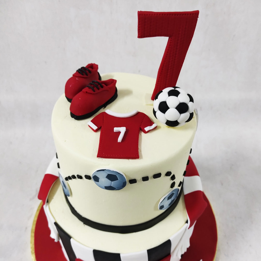 Two tier football cake | Football cake | Football birthday cake ...
