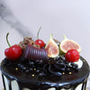 The chocolatey goodness of this fruit chocolate cake for boys / girls extends into the delicious drip pattern where glossy, scrumptious chocolate oozes down the sides of the clean white base of this birthday cake for dad / birthday cake for mom.