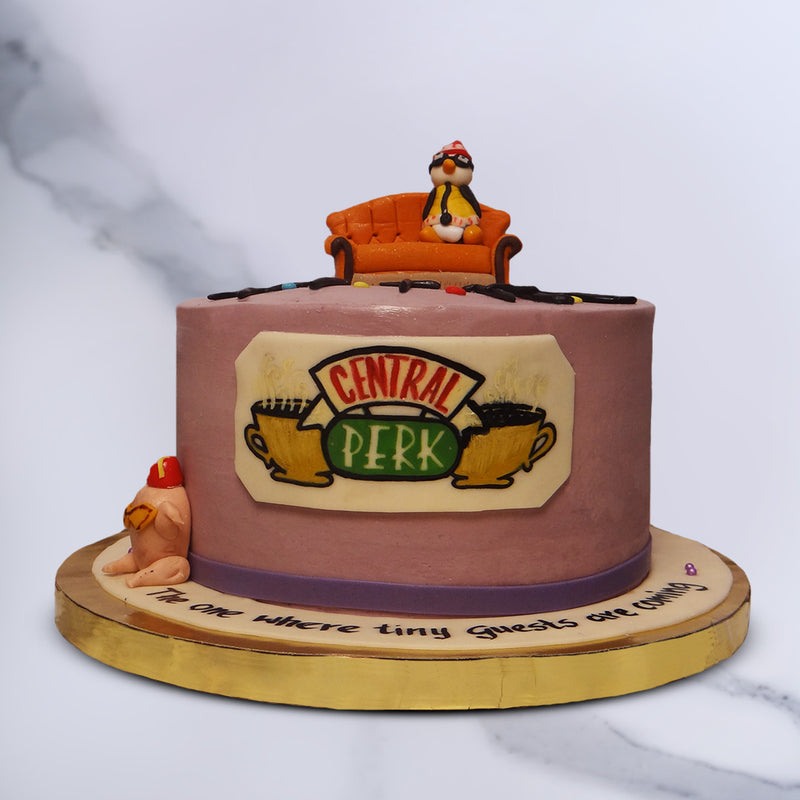 There are so many different elements of the show incorporated into this Friends themed birthday cake for boys/girls. From the colour of Monica's apartment represented in the base, to the title on the edible banner at the bottom where the message is inscribed in the format of the episode titles.