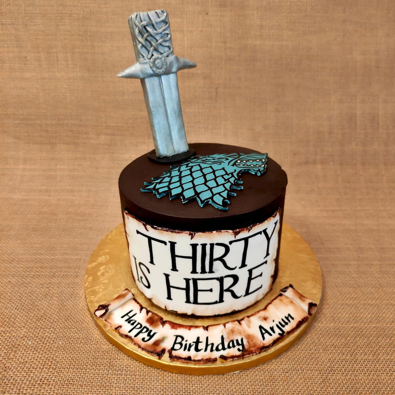 Game of Thrones cake design would make an excellent statement piece as a 30th birthday cake for him. 