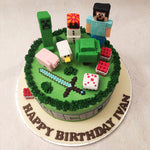 The characters of this Minecraft theme cake design have been replicated in a lego-like, pixelated pattern to recreate the world of the game