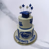 Top view of graduation cake which shows you an over all picture of this cake, we have a graduation hat with stars and the school logo with a congratulations message on this graduation theme cake